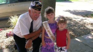 veteran with granddaughters, veterans day